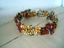 Fin bracelet vintage aux médaillons mordorés 
