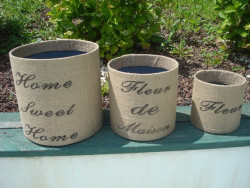 Série de 3 caches pots en métal recouvert de toile de jute