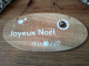 Petite pancarte ovale en bois naturel "Joyeux Noël"
