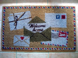 Paillasson original aux enveloppes 'Welcome Home"