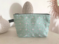 Trousse à maquillage imprimée de fleurs dans des cercles