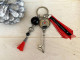 Porte clés vintage "Love" et pompon rouge